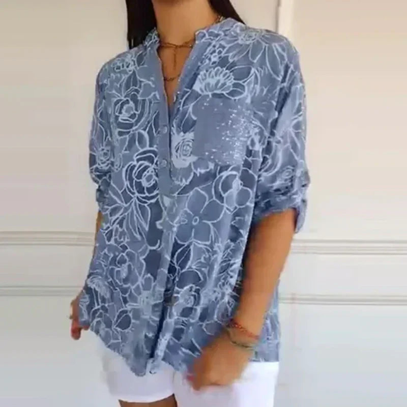 Blomstrende funklende bluse