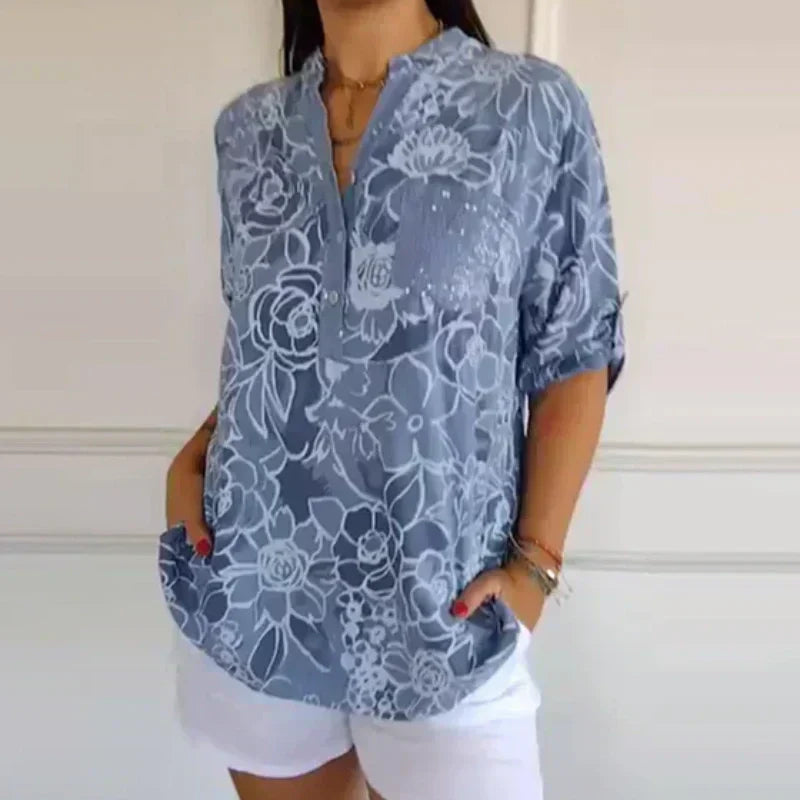 Blomstrende funklende bluse