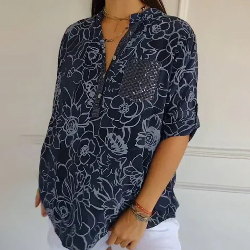 Blomstrende funklende bluse