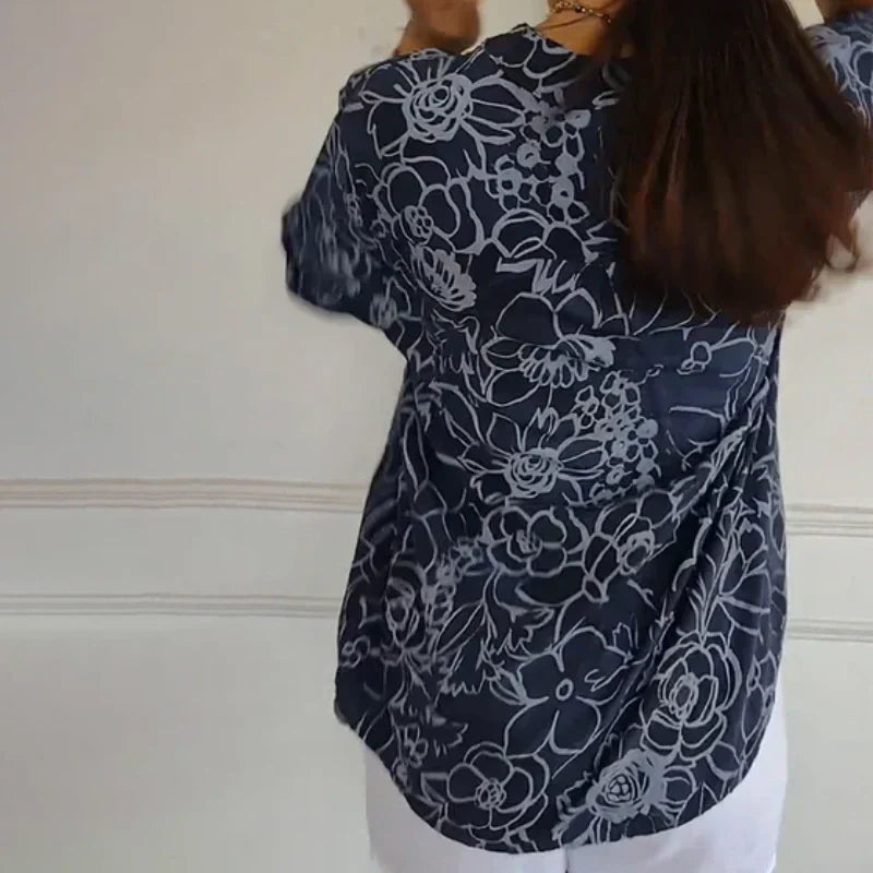 Blomstrende funklende bluse