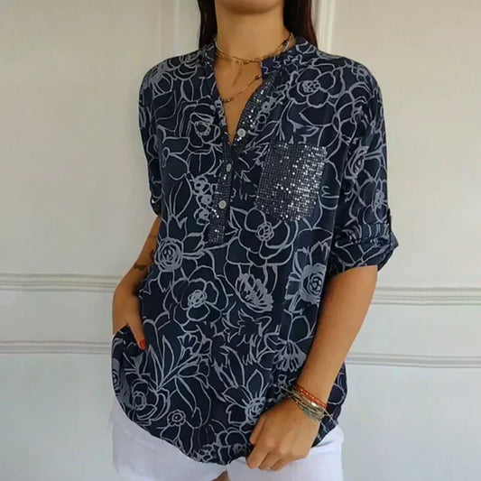 Blomstrende funklende bluse